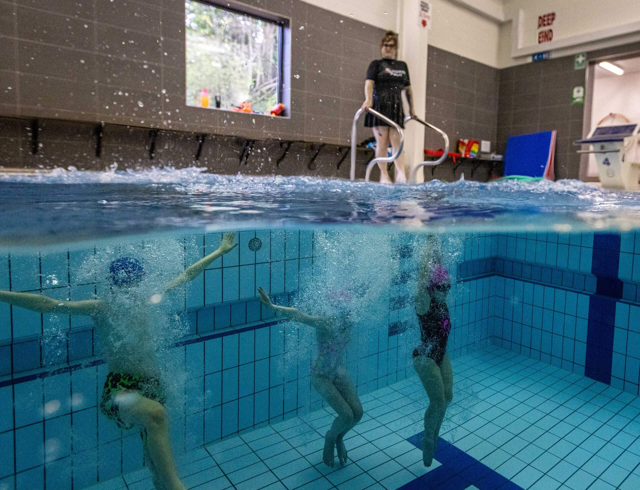 Learners underwater at Godstowe Swim School, High Wycombe